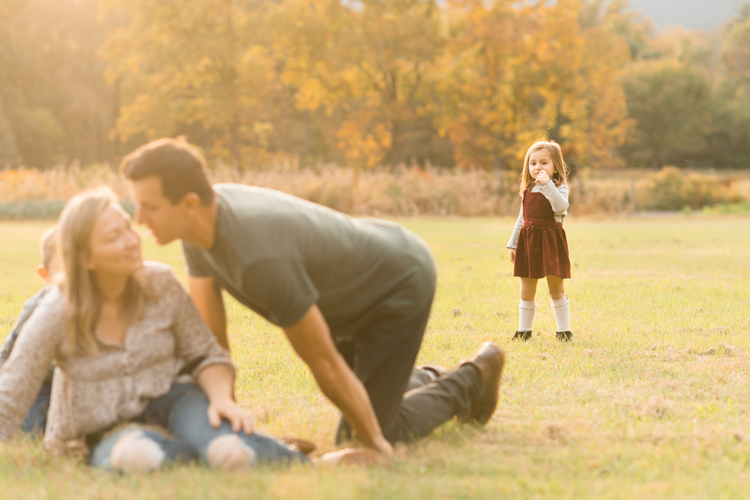 Fall is in full swing here in NJ, my first Fall Family session with Anna and Adam at their Farm House in Hackettstown NJ. Anna and Adam recently purchased their dream farm house on a 4 acres of land. This family of four now has chickens, ducks, birds, cats, a dog, sheep and plans to add many more to the list in the future. I had the honor of visiting Anna and Adam and their two beautiful children at their Farm the other day. I got much need vitamin D walking around the property, enjoying the foliage, running around with their kids and meeting all the farm animals. I sincerely enjoy photographing families now because there are no dull moments with kids, every moment is perfect! Fall family session at Anna and Adam’s Farm at Hackettstown NJ photographed by Karis from HeyKaris.